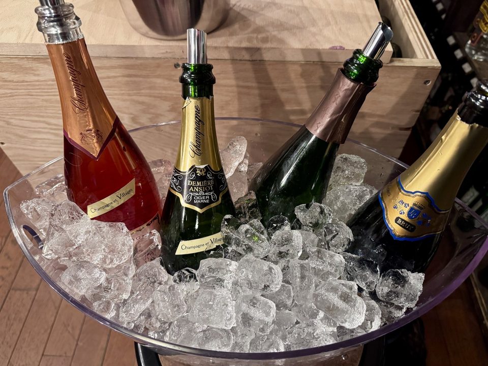 Four champagnes on ice: a rosé, Demière-Ansiot Oger Grand Cru and two more with pour spouts