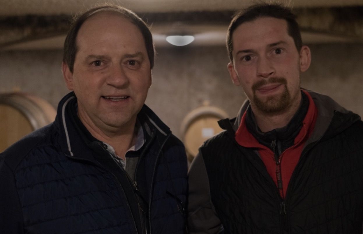 Denis and Nicolas Bachelet, father and son, in the cellar