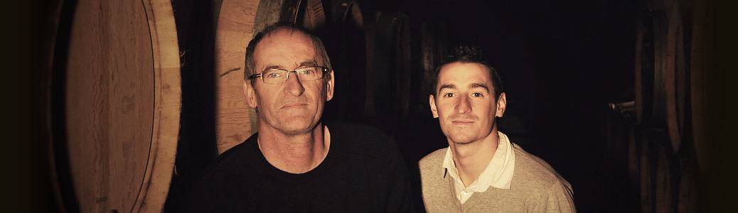 Michel Moingeon and his son Florent among the barrels