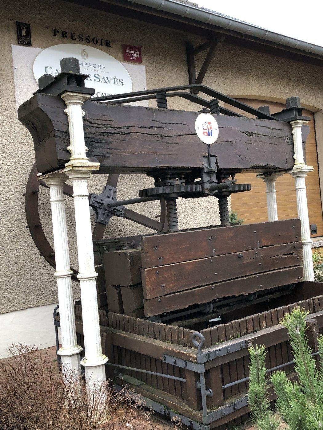 The old wooden Champagne press standing outside the Camille Savès winery in Bouzy