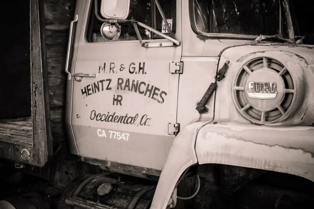 An old farm truck with Heintz Ranches, Occidental painted on the door.