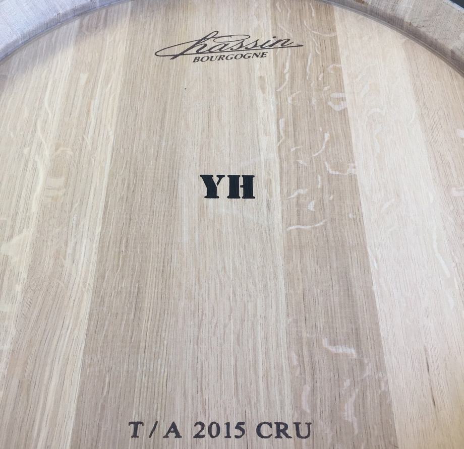 The head of a new French oak barrel branded YH.