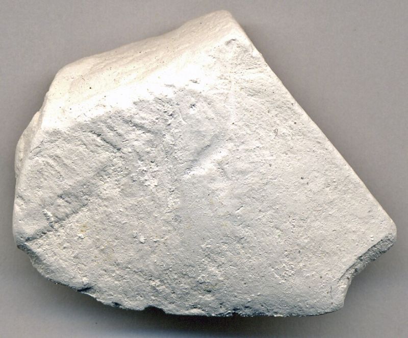 Chalk from the Upper Cretaceous, the same age and kind as the chalk under Champagne.